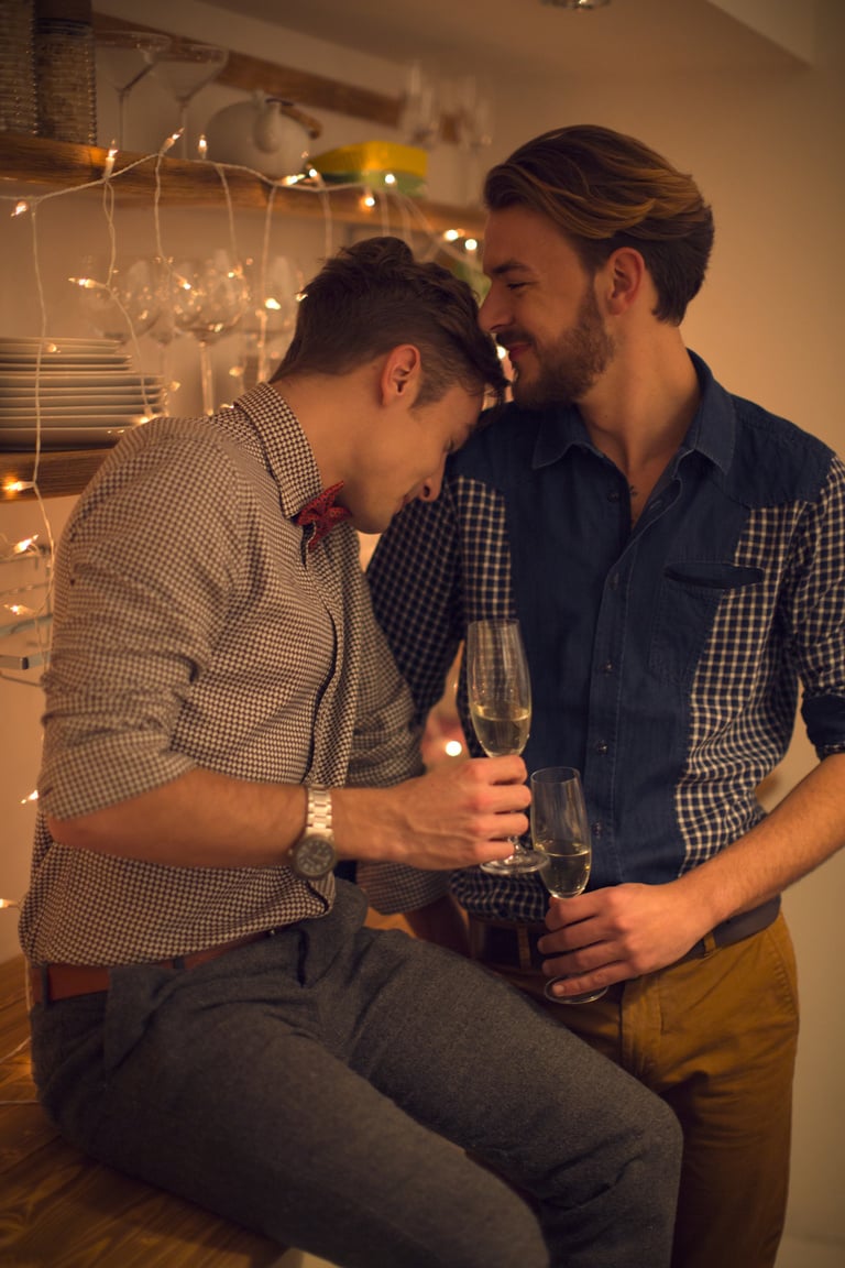 Men Holding Glasses of Wine 